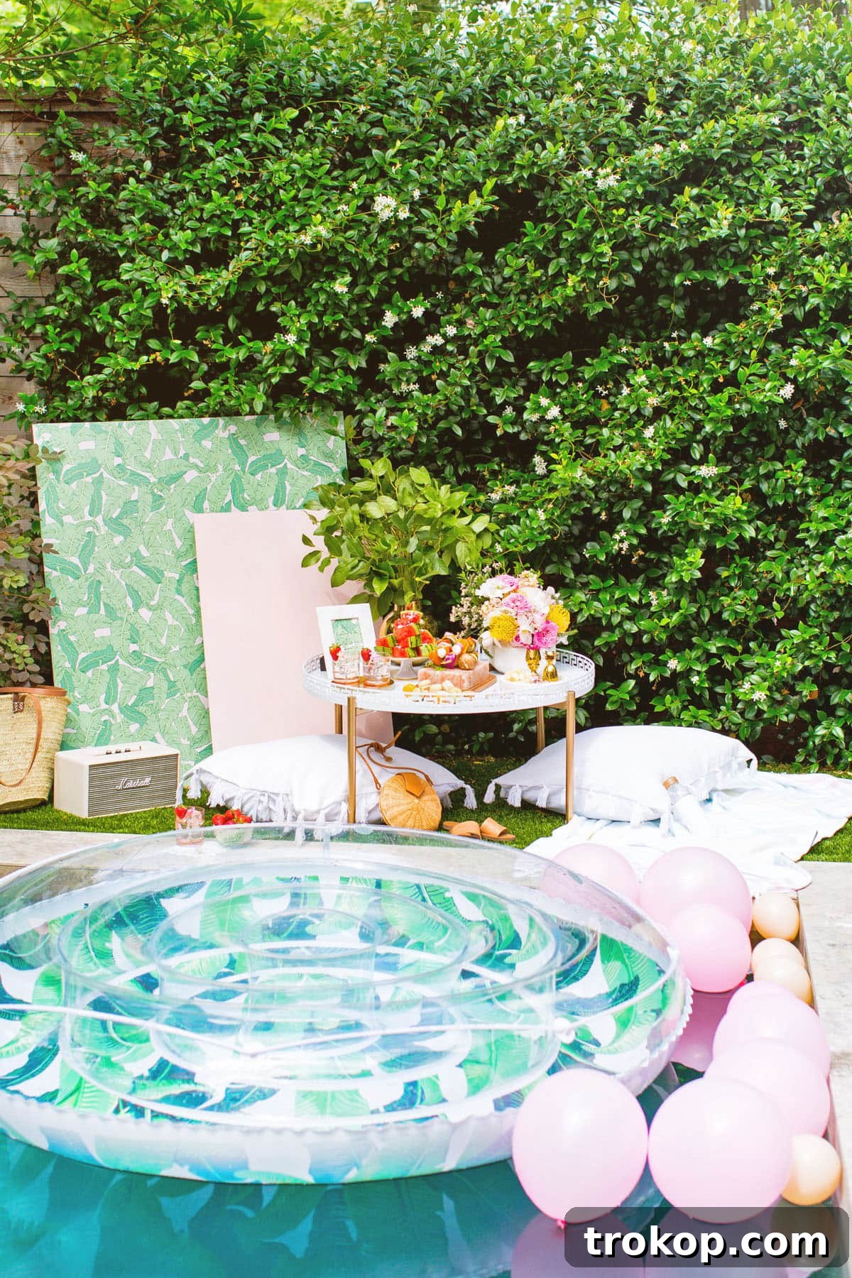 Opulent Poolside Soirees 6 Blogger attempting to gracefully get onto a large pool float.