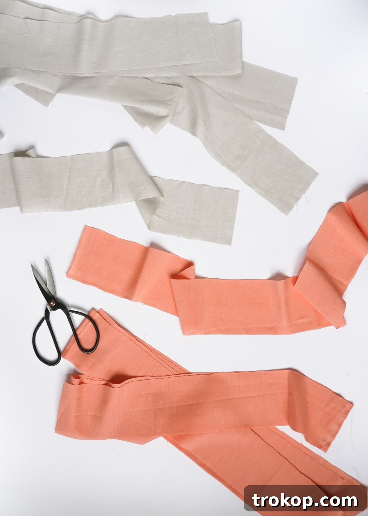 DIY Tailored Pleat Lumbar Cushion 5 Cutting fabric pieces for DIY pleated pillow.