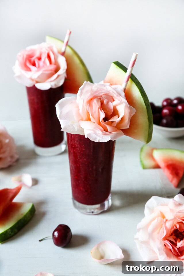 Cherry Watermelon Frosé Delight 9 Cherry Watermelon Frosé Garnished with Roses