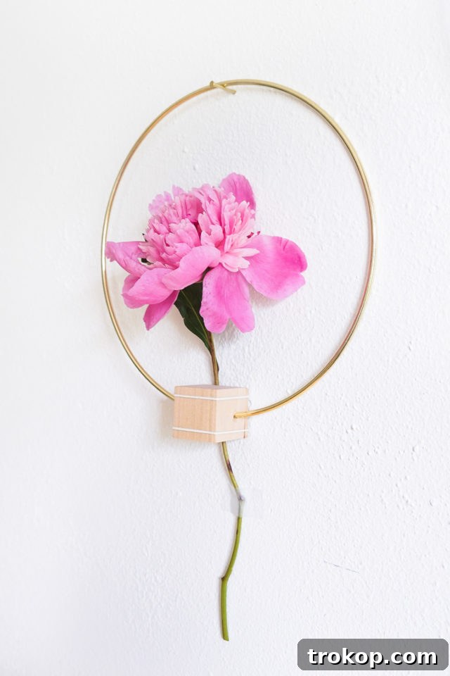 Final view of a DIY Minimalist Flower Wall Hang with vibrant pink peonies, showcasing easy home decor