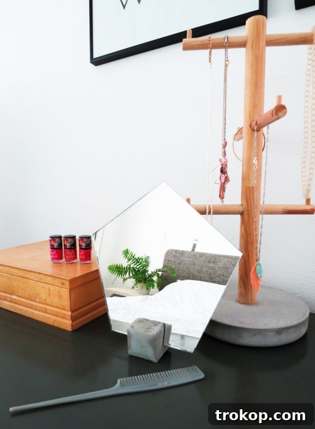 Crafting materials laid out for the DIY concrete vanity mirror project.