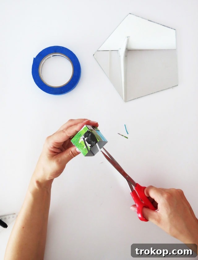 Cutting diagonal notches into the mold to hold the mirror securely.
