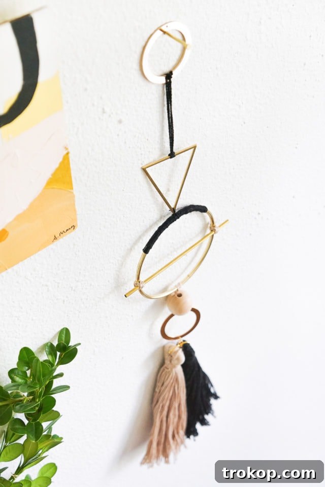 DIY Geometric Metal Wall Hang by Ashley Rose of Sugar & Cloth, showcasing modern home decor