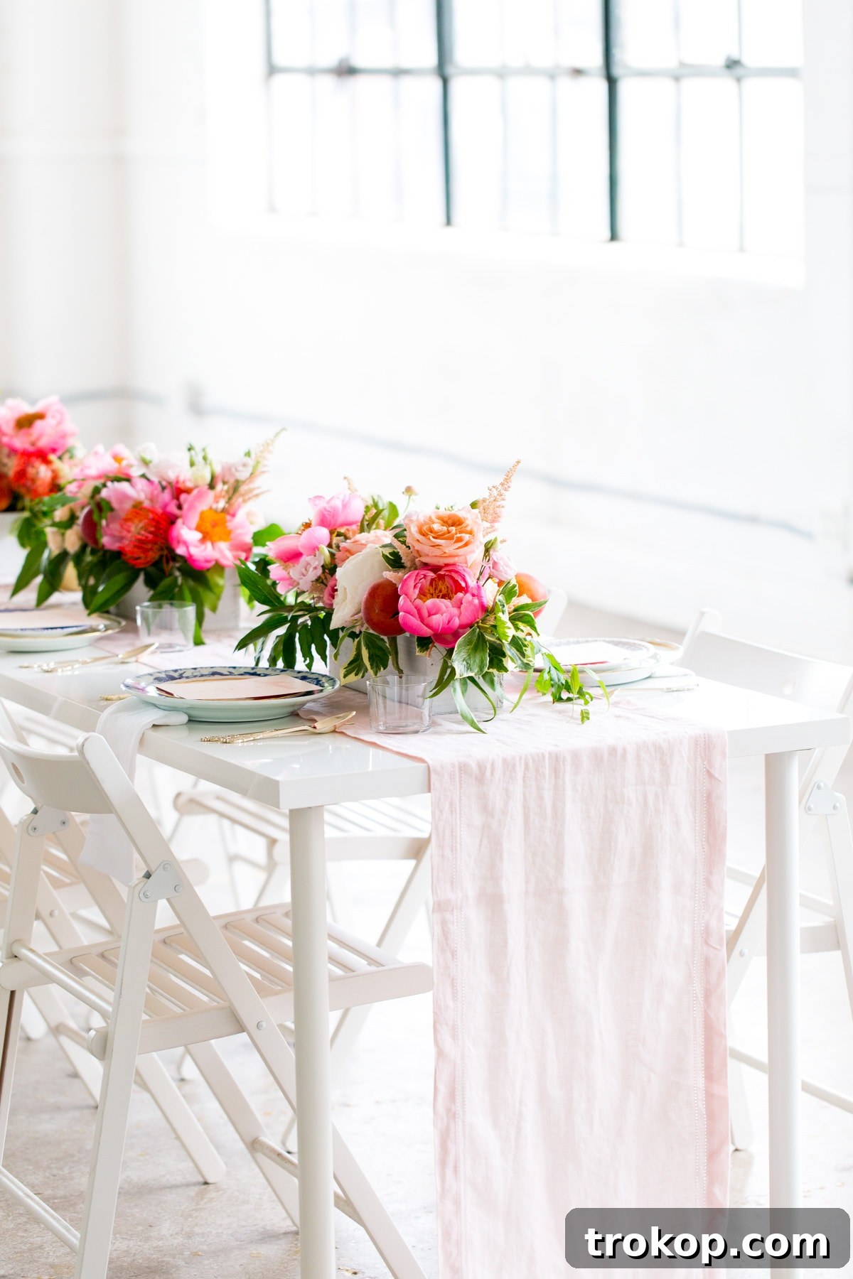 Charming Southern bridal shower table setting with blue floral plates