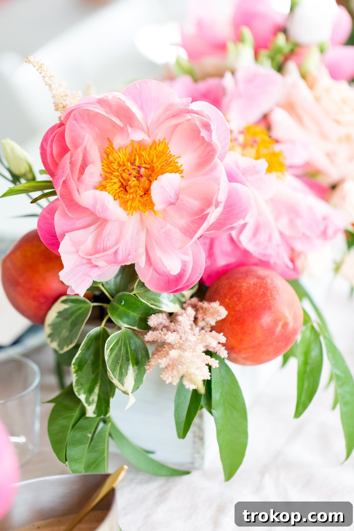 Elegant bridal shower setting with a DIY floral backdrop at Studio HTX