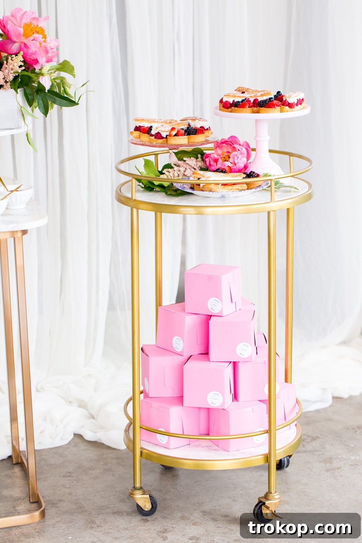 Detailed view of bridal shower flowers with fresh fruit accents