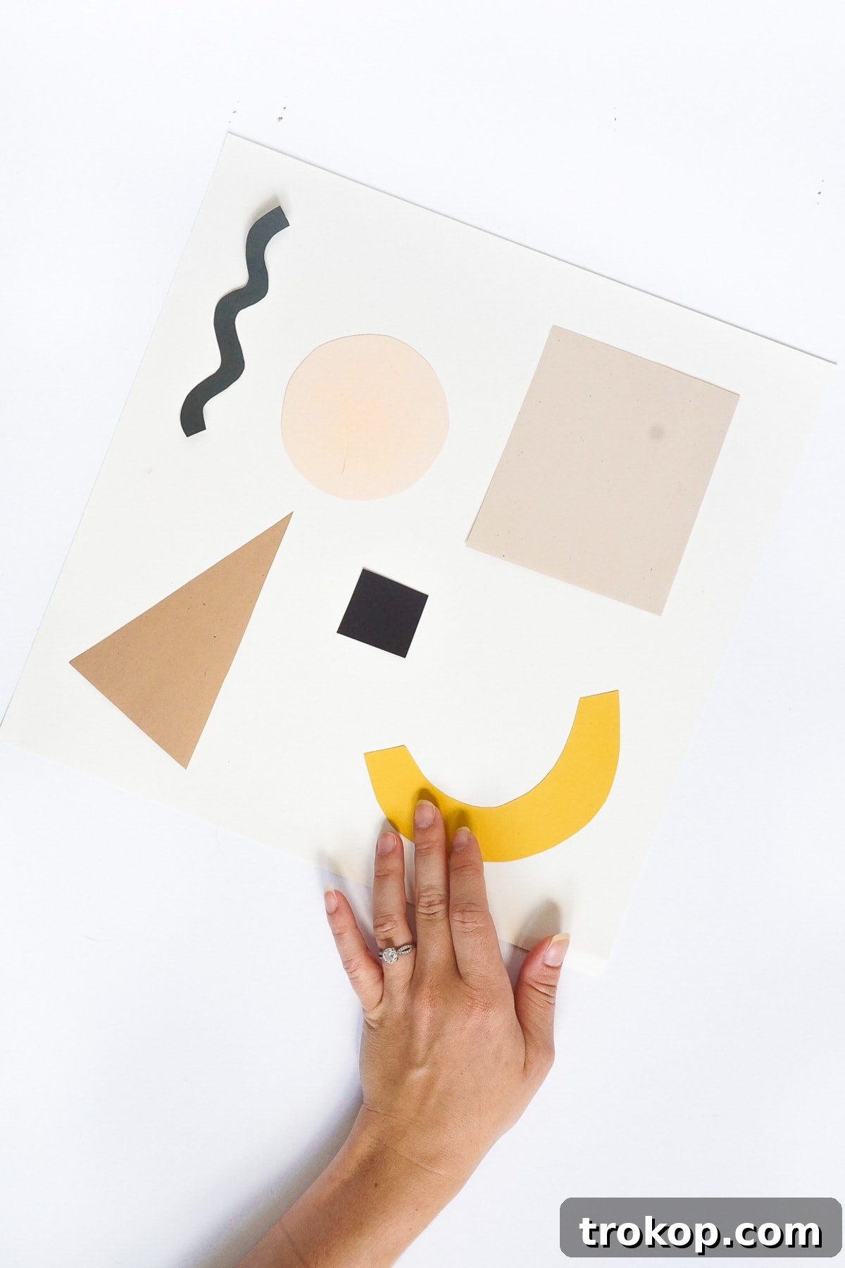 Handmade Paper Wall Decor 7 DIY Paper Shapes Wall Art by Ashley Rose of Sugar & Cloth, a top lifestyle blog in Houston, Texas