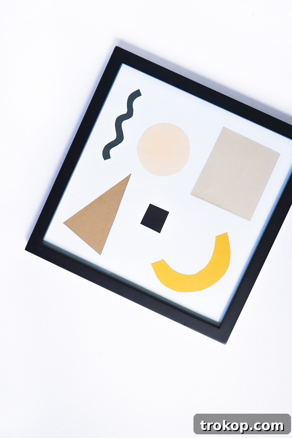 Handmade Paper Wall Decor 8 DIY Paper Shapes Wall Art by Ashley Rose of Sugar & Cloth, a top lifestyle blog in Houston, Texas
