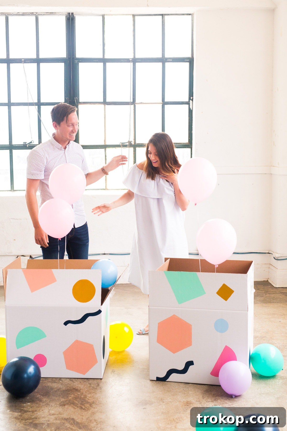 Little Sugar and Cloth Unveils Our Colorful Gender Reveal 9 Happy parents with pink balloons for baby girl reveal