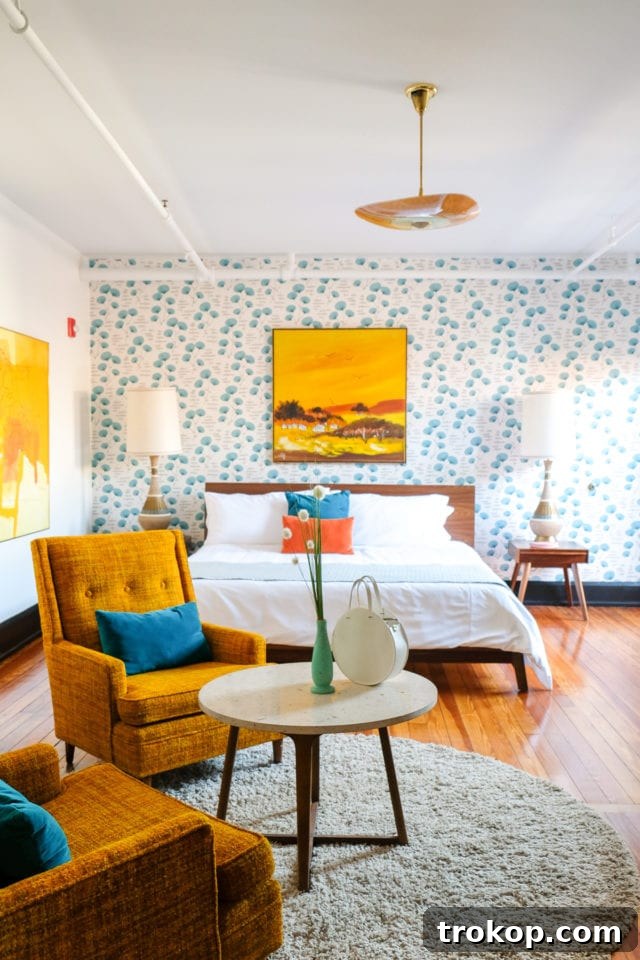 Friends enjoying a stylish gathering space at The Dwell Hotel