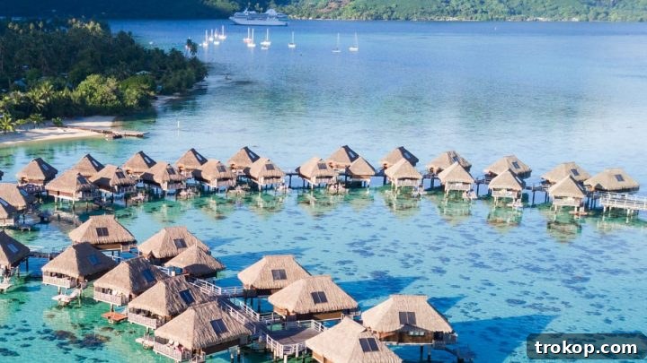 Overwater bungalows and turquoise waters in Moorea, French Polynesia, a perfect honeymoon destination