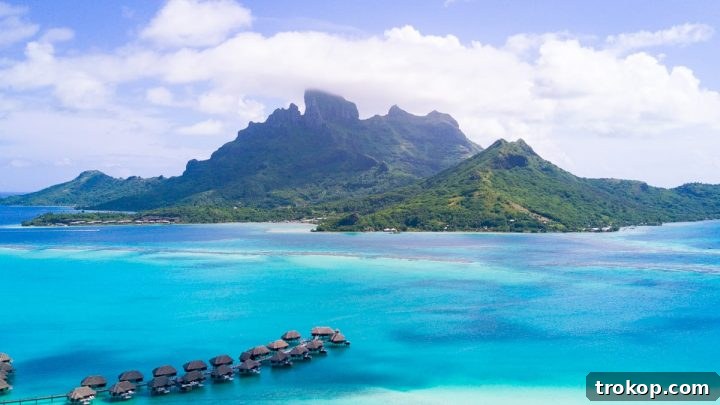 Stunning overwater bungalows and clear blue lagoon in Bora Bora, French Polynesia