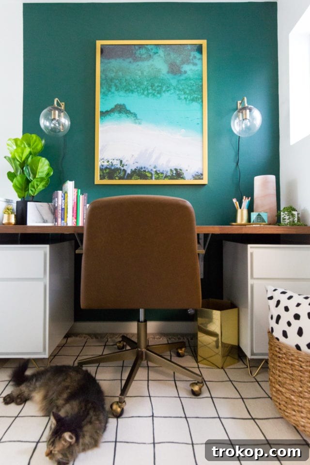 Transformed study nook after a vibrant green accent wall and new desk installation