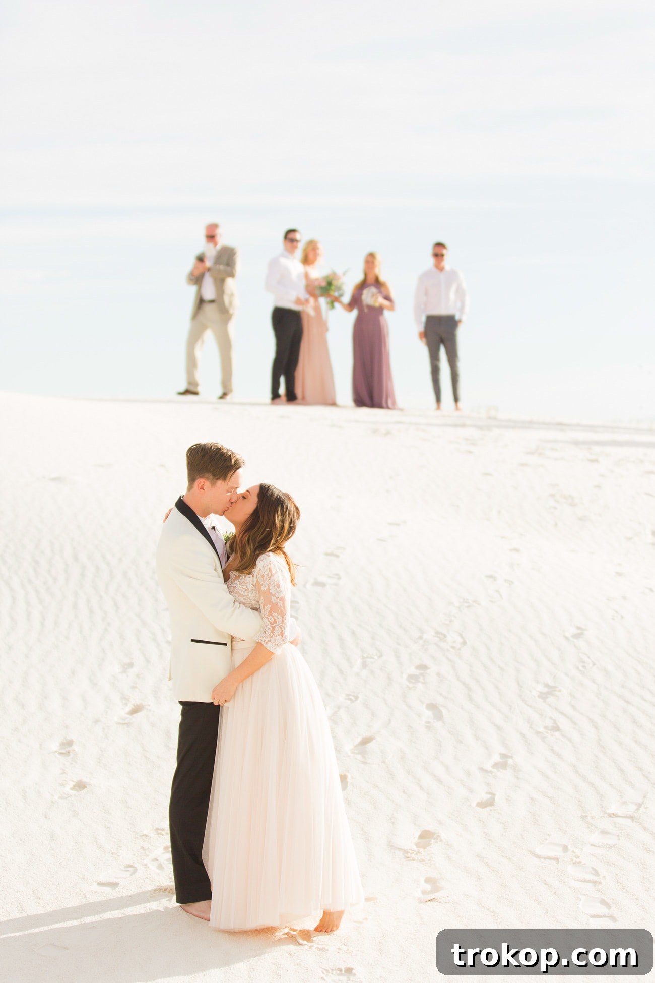 First kiss as husband and wife at their White Sands elopement