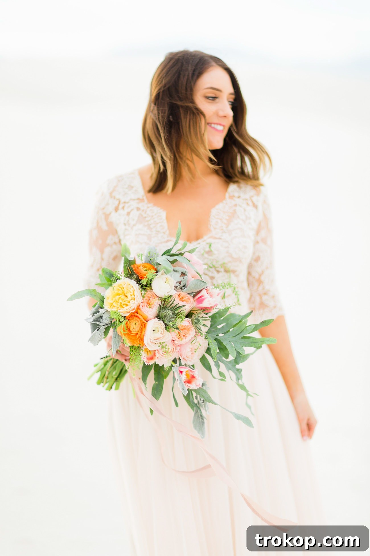 Joyful wedding moments captured in the desert landscape of White Sands