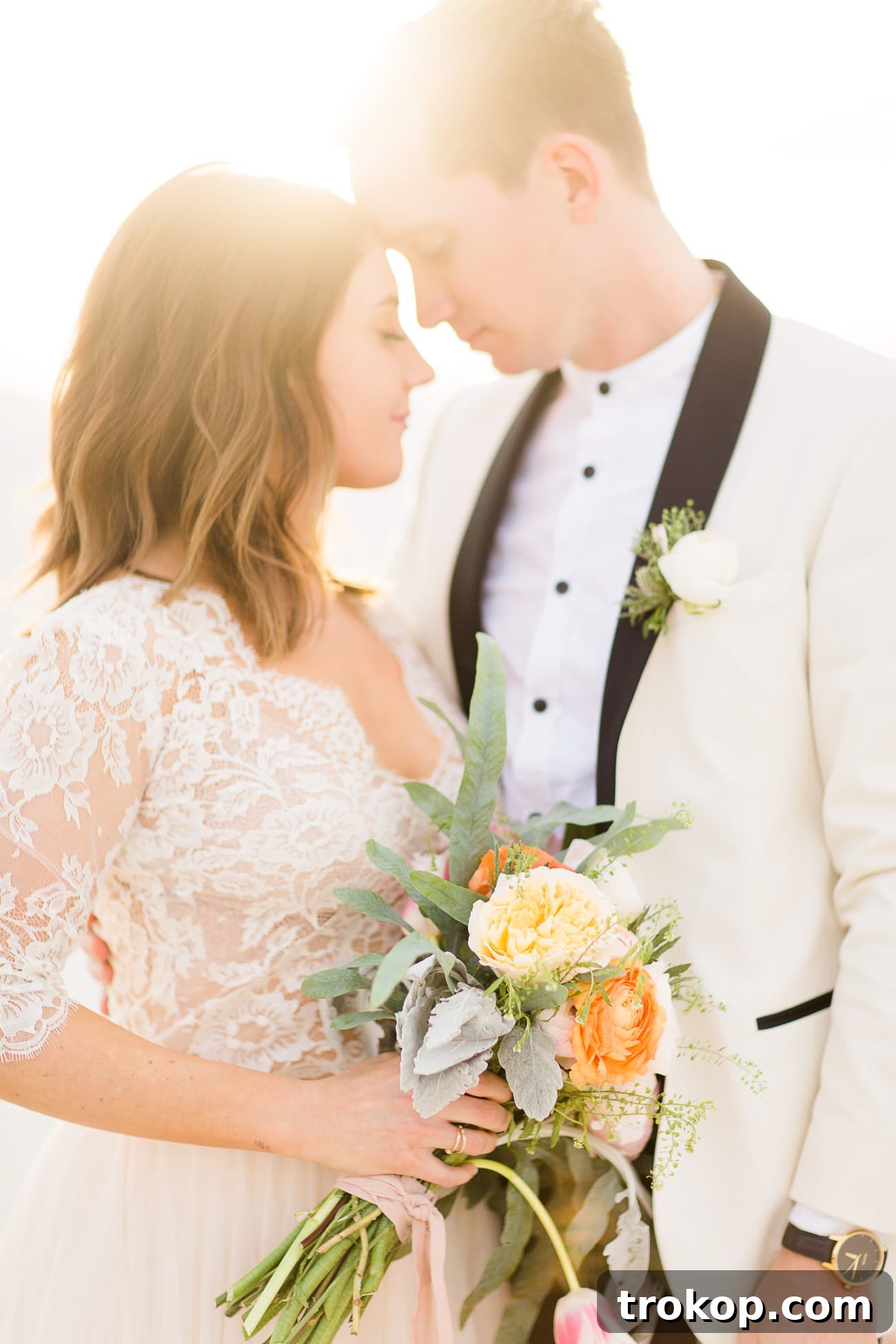 Intimate moment shared by the couple during their desert wedding