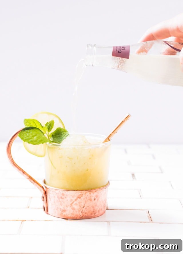 Finished Moscow Mule Float with lime and mint garnish