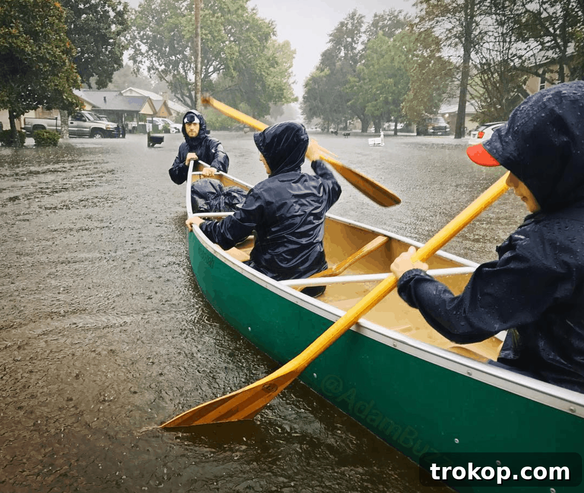 Houston's Storm Response: Updates and Harvey Relief Drive 3 Houstonians rescuing neighbors by boat in flooded streets