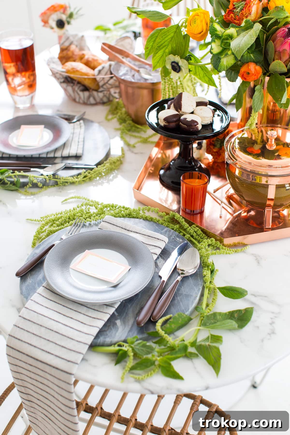 Gothic Glamour: Elevated Halloween Tablescapes 11 A Sophisticated Halloween Dinner Table Setting