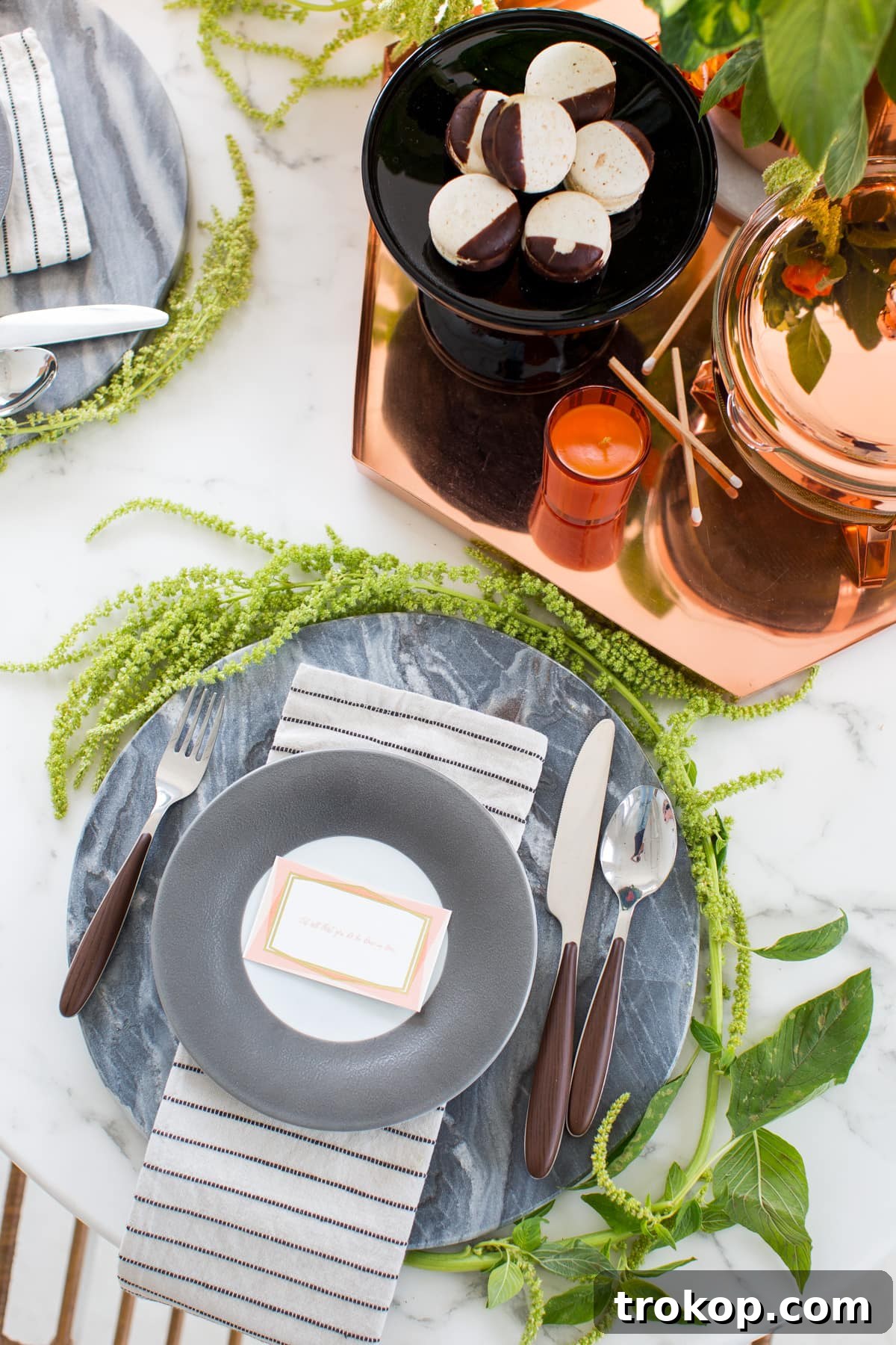 Gothic Glamour: Elevated Halloween Tablescapes 10 A Sophisticated Halloween Dinner Table Setting