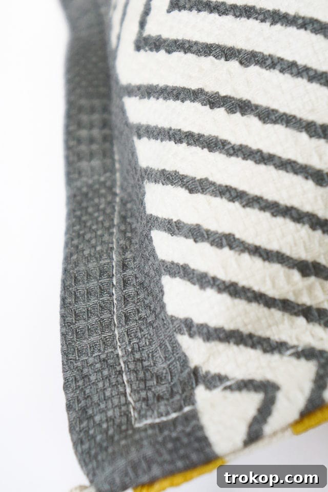 DIY Tasseled Throw Pillows by Ashley Rose of Sugar & Cloth, a top lifestyle blog in Houston, Texas