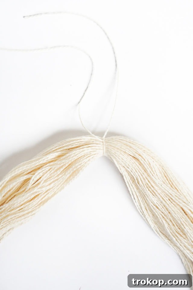 DIY Tasseled Throw Pillows by Ashley Rose of Sugar & Cloth, a top lifestyle blog in Houston, Texas