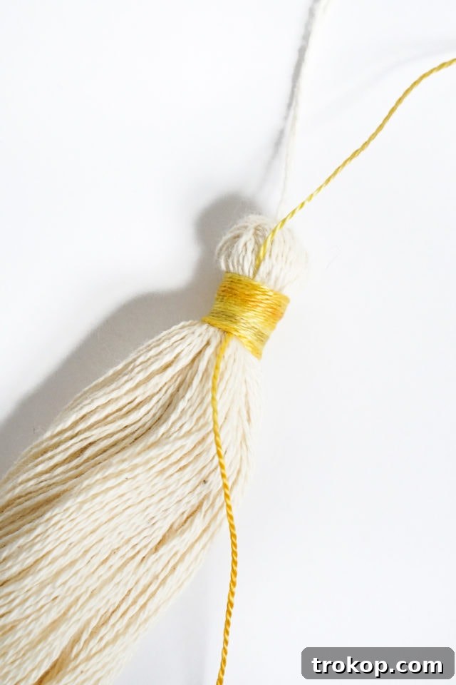DIY Tasseled Throw Pillows by Ashley Rose of Sugar & Cloth, a top lifestyle blog in Houston, Texas