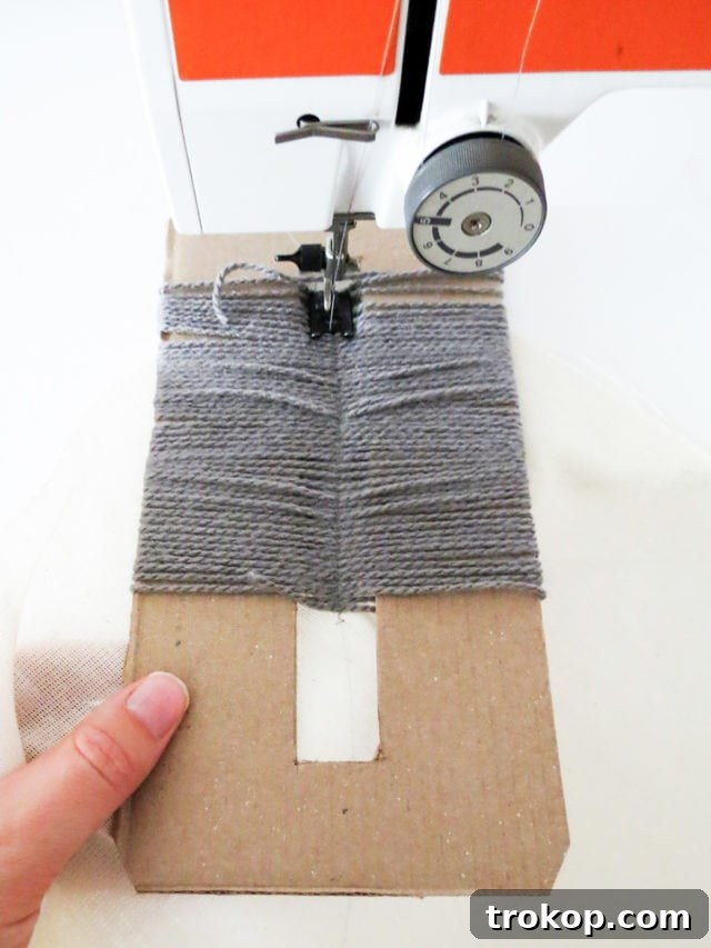 Boho Yarn Fringe Pillow Project 9 Sewing the yarn fringe onto the fabric using a sewing machine
