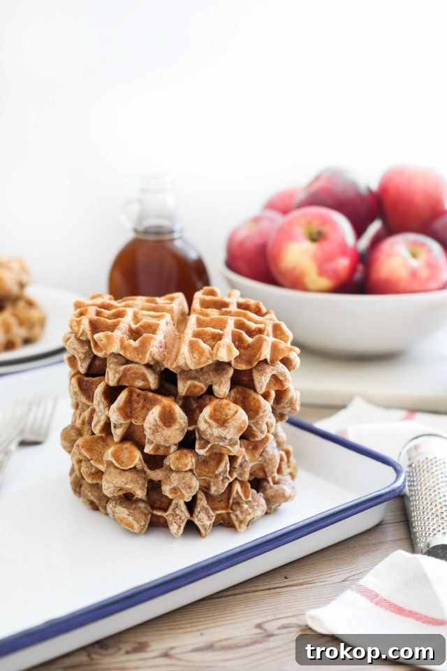 Bourbon-Glazed Spiced Apple Cinnamon Waffles 3 Delicious Spiced Cinnamon Apple Waffles with Bourbon Syrup, perfect for fall breakfast