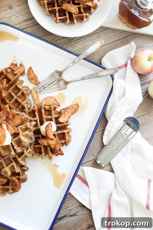 Bourbon-Glazed Spiced Apple Cinnamon Waffles 7 Spiced Cinnamon Apple Waffles with bourbon syrup and a side of fresh berries