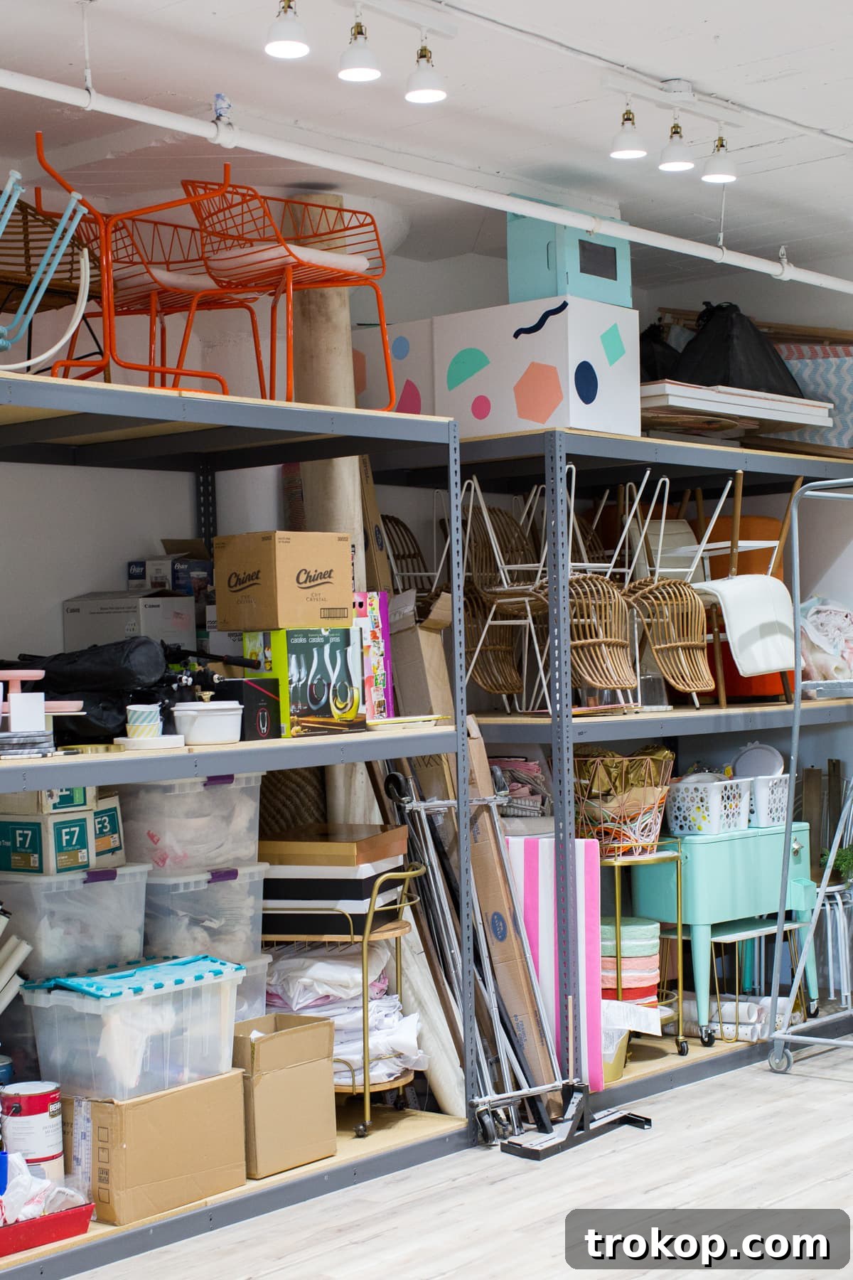 Crafting Our Studio: A Weekly Dose of Progress & Inspiration 6 Studio Reno Trace.png - Wide shot of the studio showing Uline industrial shelving and the challenge of organizing various items.
