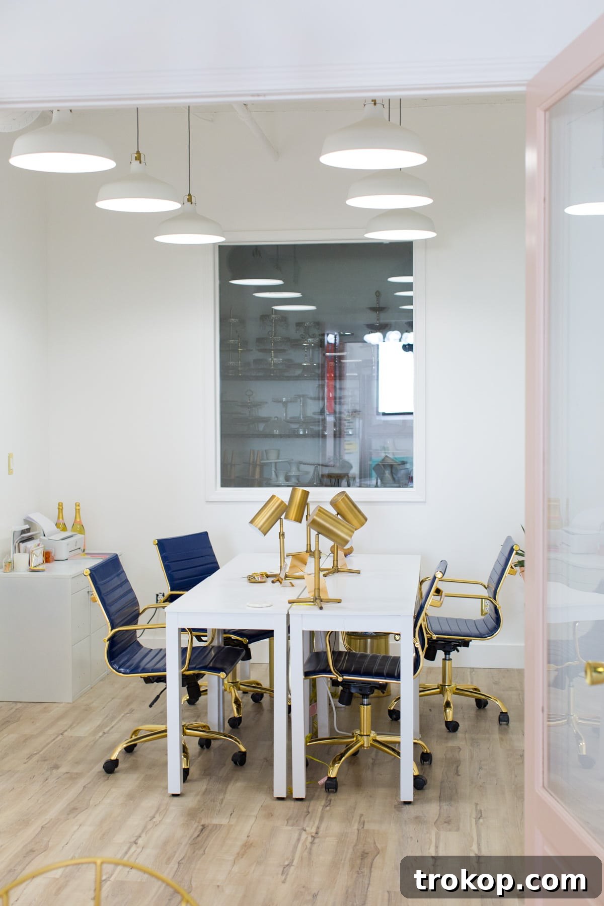 Crafting Our Studio: A Weekly Dose of Progress & Inspiration 7 Studio Reno Trace.png - Closer view of the industrial shelving, highlighting the need for strategic organization solutions.