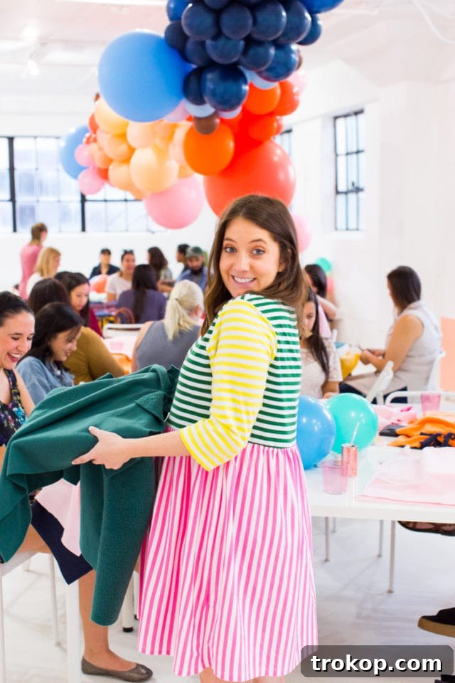 Group of people making no-sew pet beds for donation