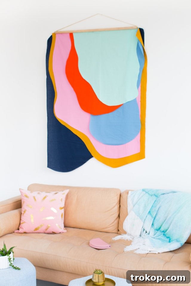 Colorful DIY Fabric Wall Hanging showcasing abstract shapes and vibrant colors, perfect for modern home decor