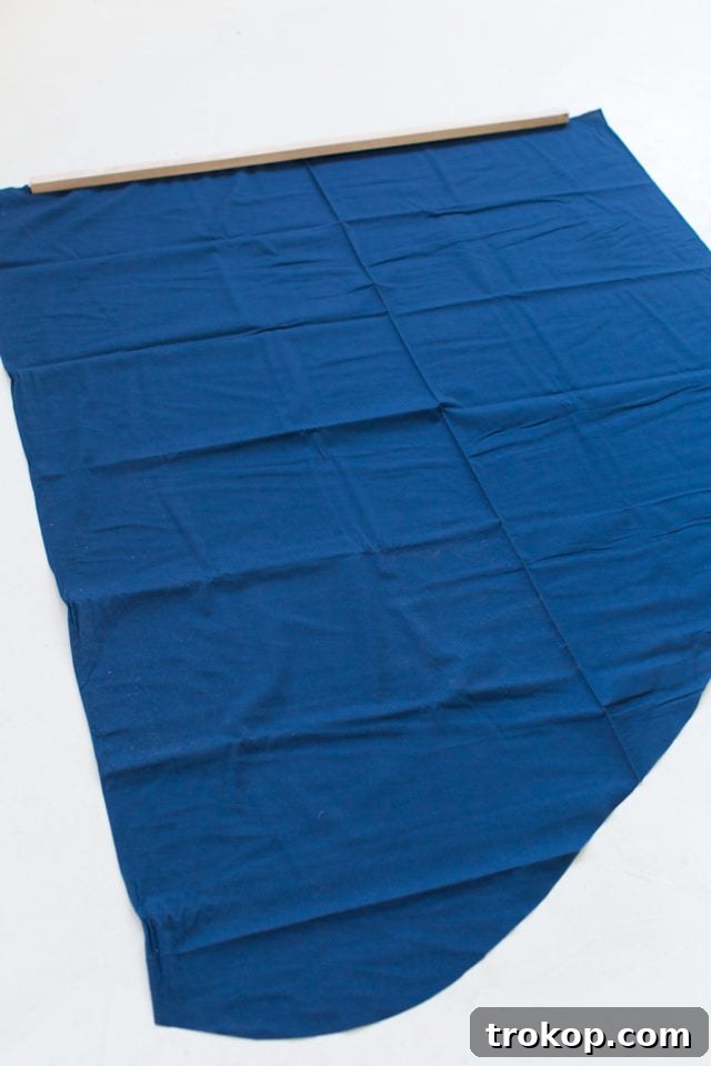 Large DIY Fabric Wall Hanging featuring multiple layers of colorful abstract fabric, adding visual interest to a room