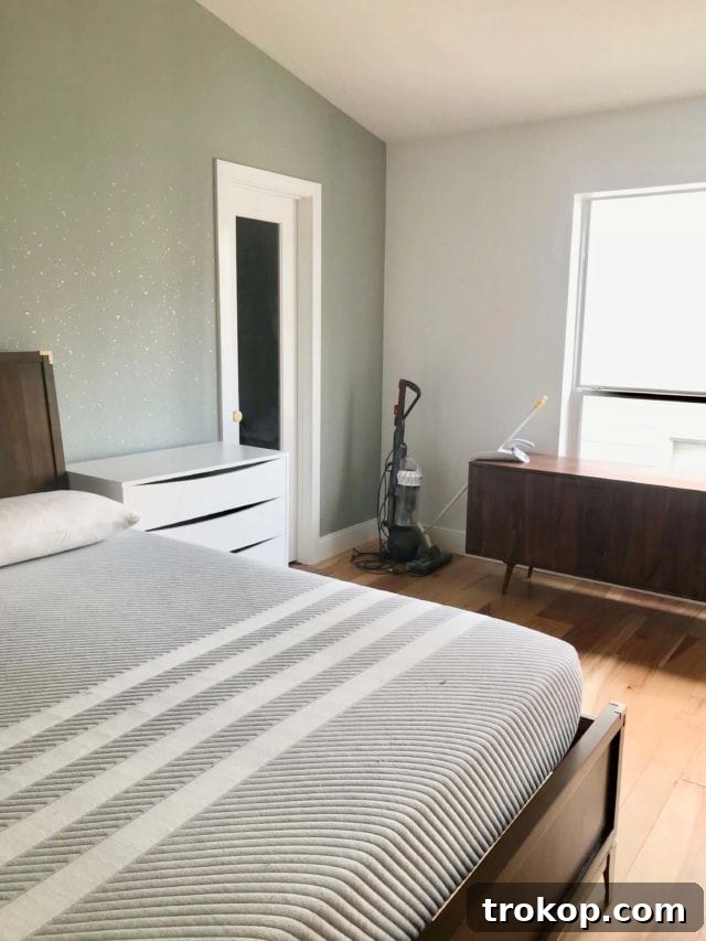Final Preview Before the Townhouse Unveiling 4 Metallic gold fleck wallpaper and new ceiling fan in the master bedroom renovation