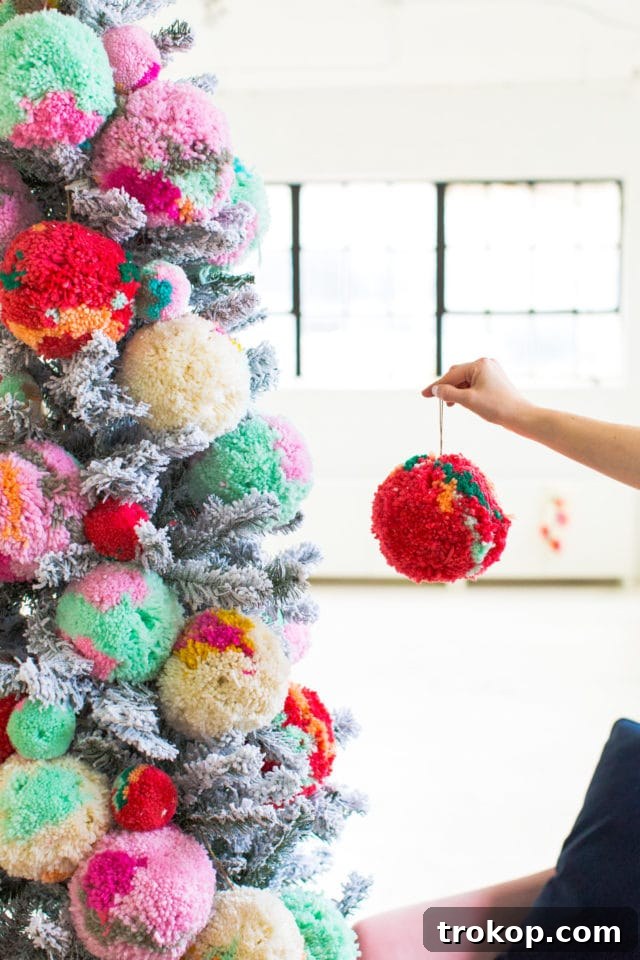 Our Studio Seating Area & How We Decorated for Christmas Decking the Studio: A Cozy Christmas Transformation 3 Close-up of Jumbo Pom Pom Ornaments on the Christmas Tree
