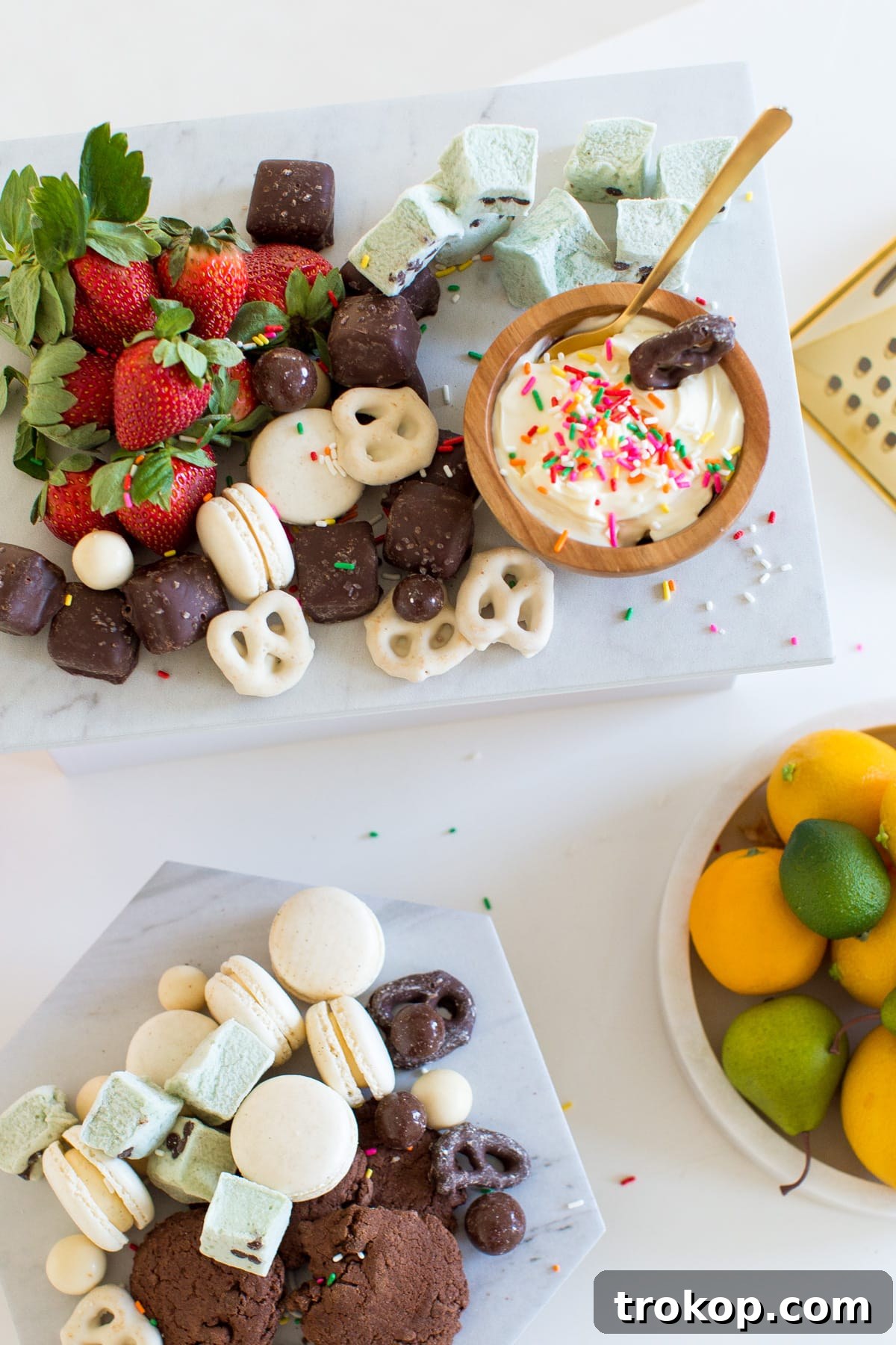 DIY Marble & Gold Serveware by top Houston lifestyle blogger Ashley Rose of Sugar and Cloth featuring a multi-tiered display with various desserts