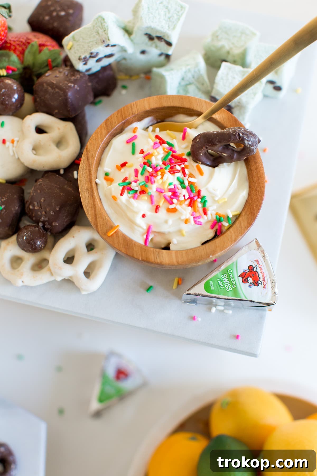 DIY Marble & Gold Serveware with a spread of delicious fruits and desserts