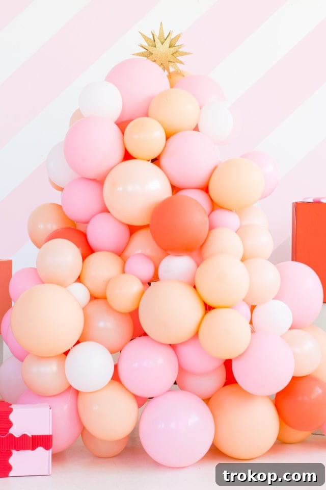 Close-up of colorful balloons forming a Christmas tree