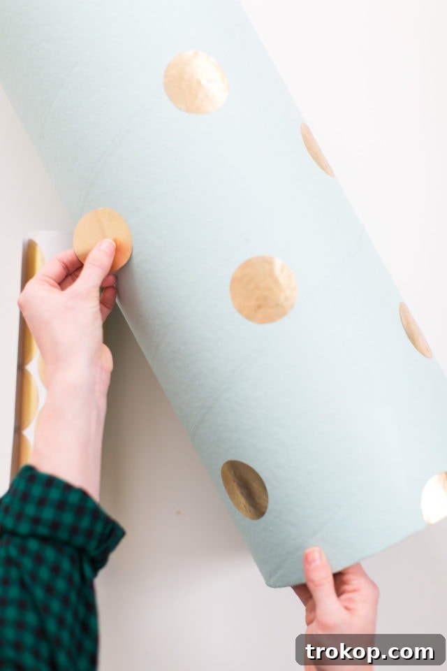 Epic DIY Confetti Blasts 7 Decorating cardboard tubes with painter's tape and spray paint for confetti poppers