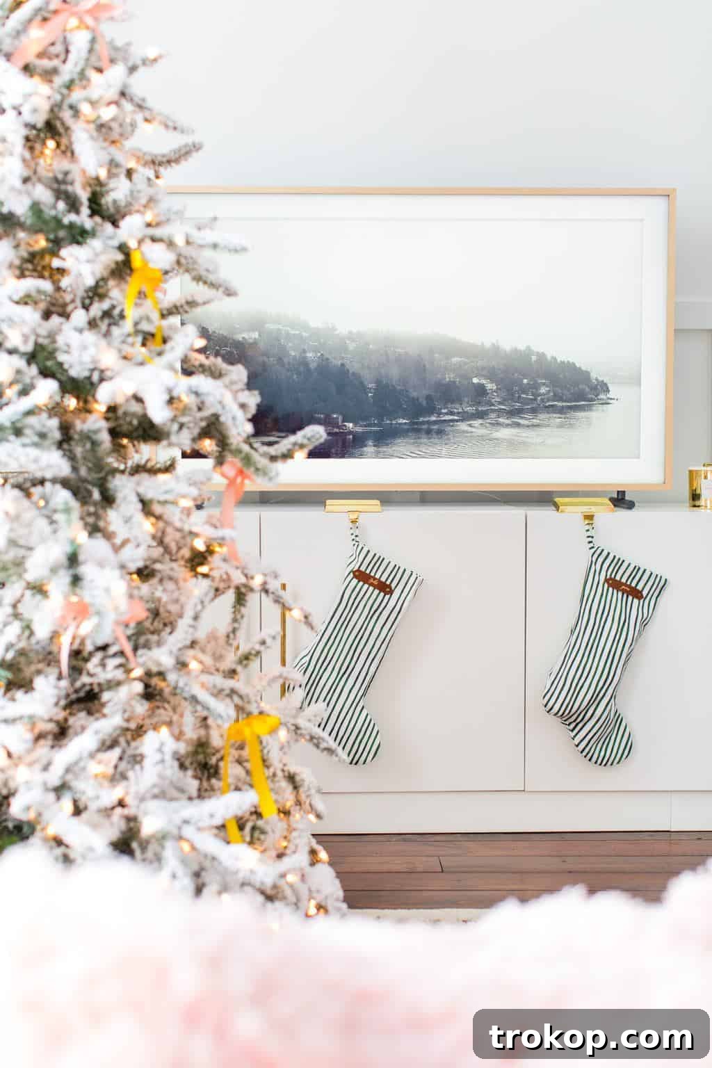 Decking the Halls Our Way 6 Festive Christmas cake and decorative bottle brush trees on a modern console