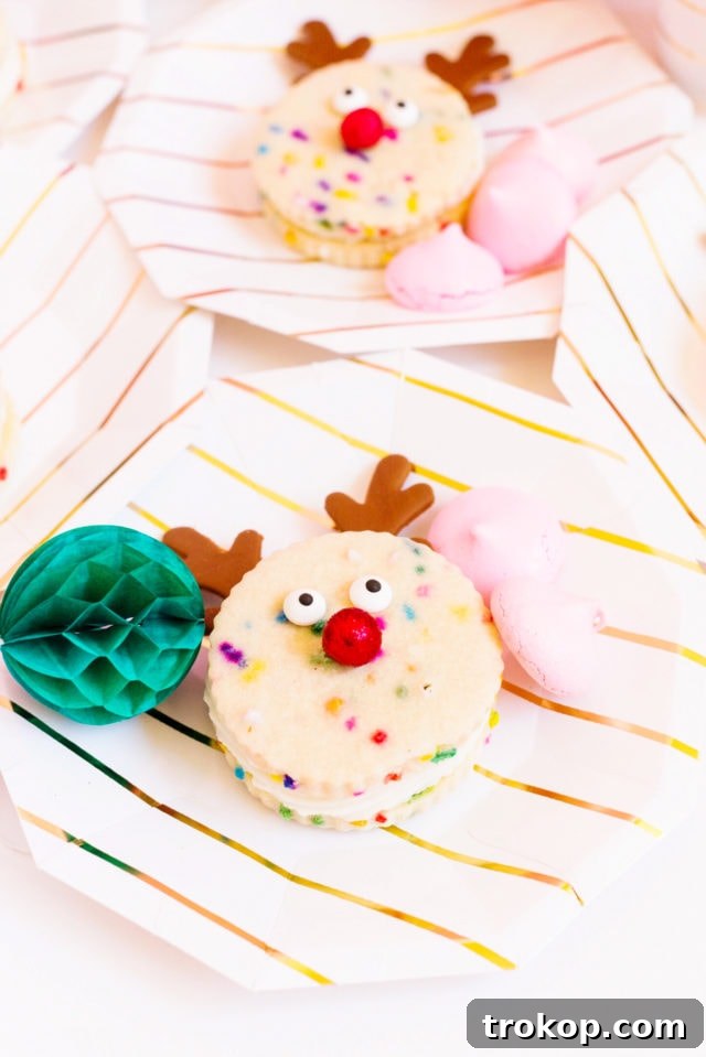 Magical Reindeer Funfetti Treats 6 Piping buttercream onto a funfetti cookie.
