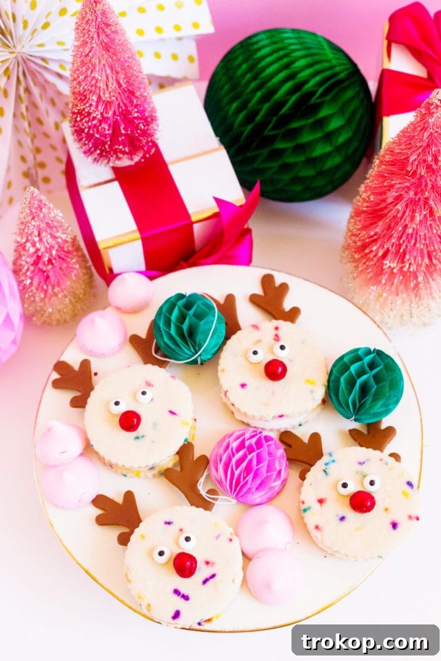 Magical Reindeer Funfetti Treats 7 Finished Funfetti Reindeer Cookie Sandwiches on a festive plate.
