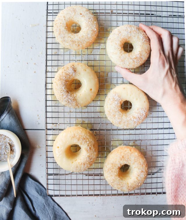 Champagne Infused Doughnuts with Velvety White Chocolate Glaze 11 A festive spread of Champagne Donuts with white chocolate glaze and sparkling wine glasses by Ashley Rose of Sugar and Cloth