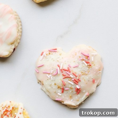 Raspberry Heart Shaped Pop Tarts Recipe by top Houston lifestyle blogger Ashley Rose of Sugar and Cloth