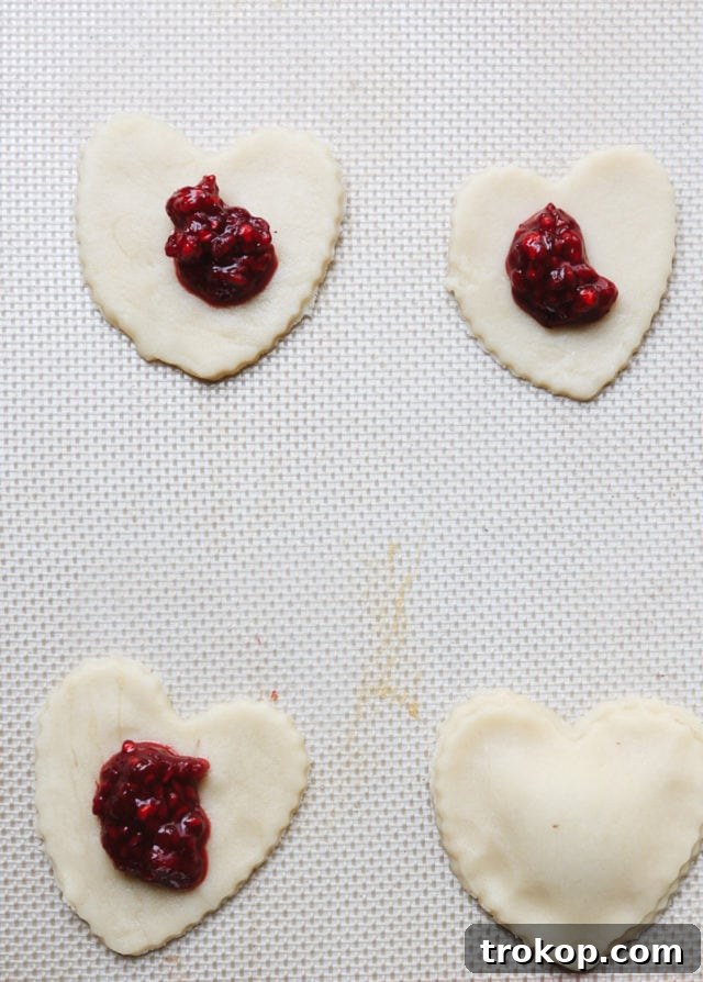Raspberry Heart Shaped Pop Tarts Recipe by top Houston lifestyle blogger Ashley Rose of Sugar and Cloth