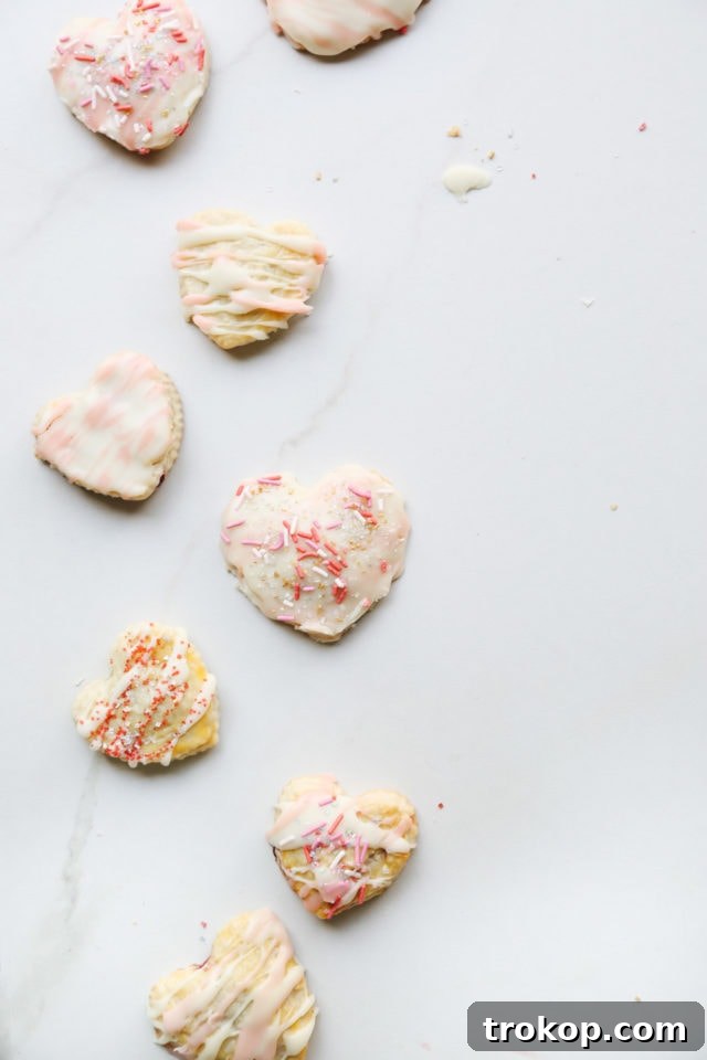 Raspberry Heart Shaped Pop Tarts Recipe by top Houston lifestyle blogger Ashley Rose of Sugar and Cloth