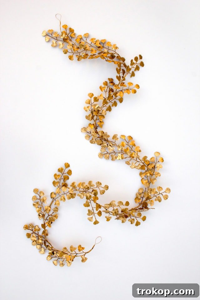 Shimmering Gold DIY: Wreaths & Garlands 14 Captivating photo of the finished DIY Gold Garland draped elegantly, ready to enhance any space with its shimmering beauty.