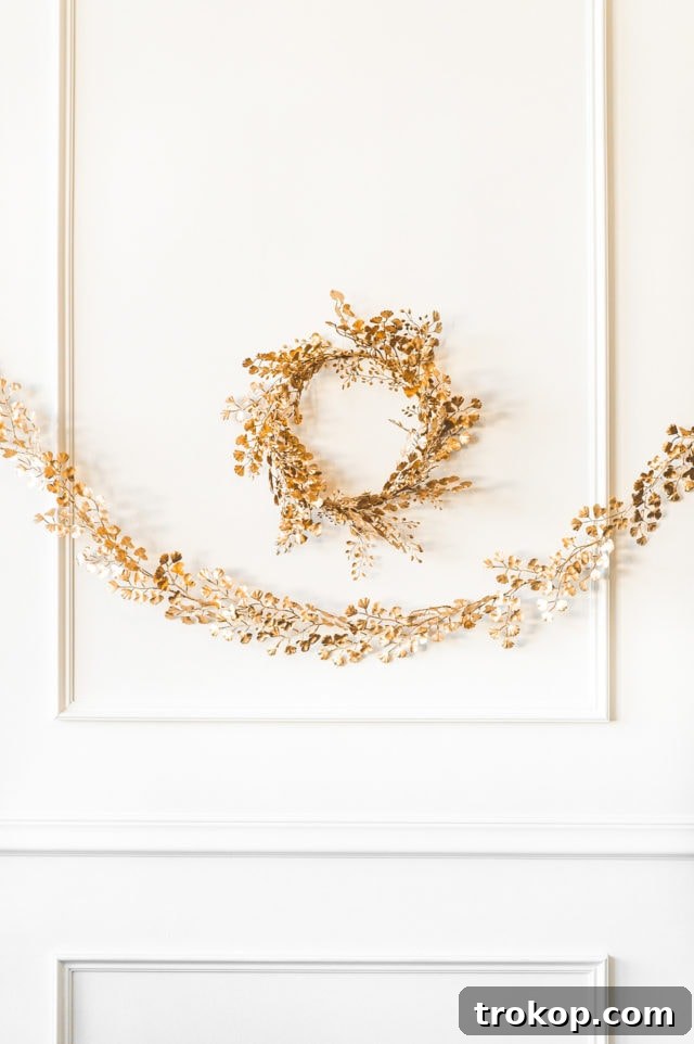 Shimmering Gold DIY: Wreaths & Garlands 16 Elegant display of a DIY Golden Wreath and Garland, showcasing their potential to elevate any home interior.